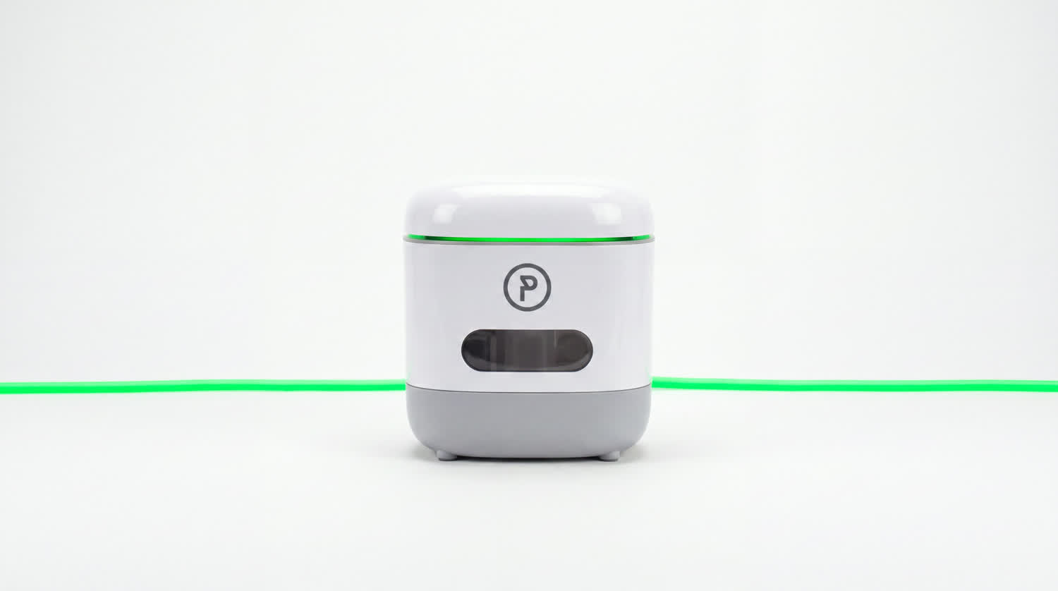 The closed PonicTank on a white studio sweep, a continuous green LED line running through it from edge to edge.